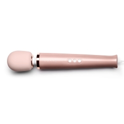 Rose Gold Le Wand vibrator Corded Rose shown in hand for scale