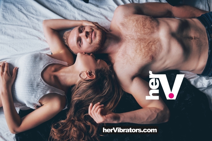 Sex machine powered thrusting device for adjustable, hands-free pleasure featuring a couple lying on a bed exploring new intimacy.