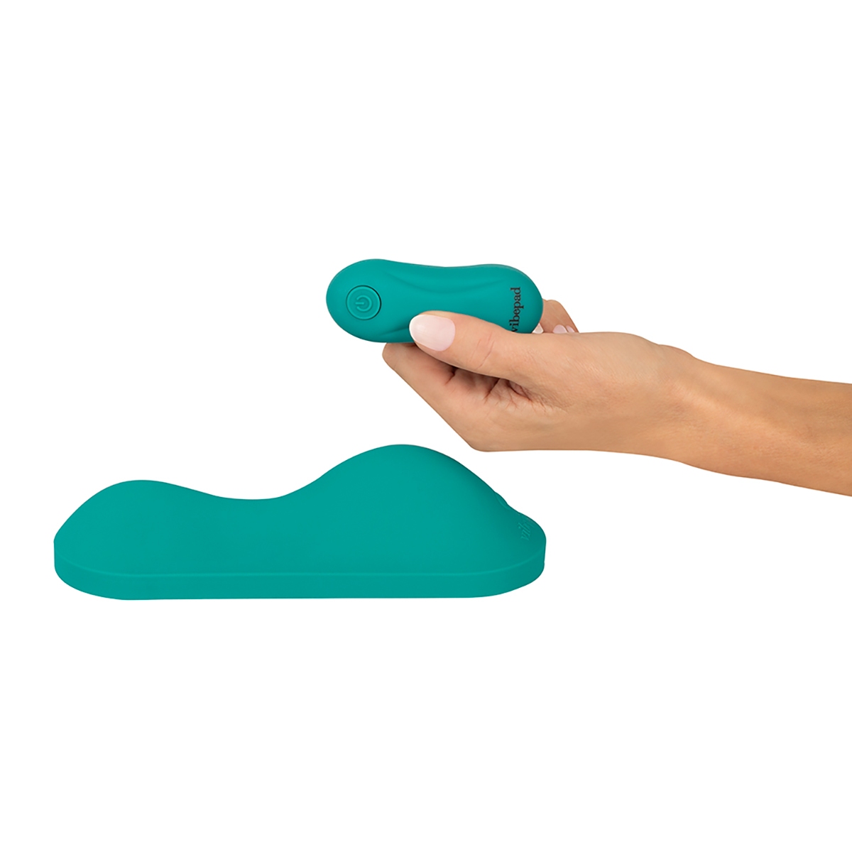 The  VibePad vibrator resting on soft fabric surface