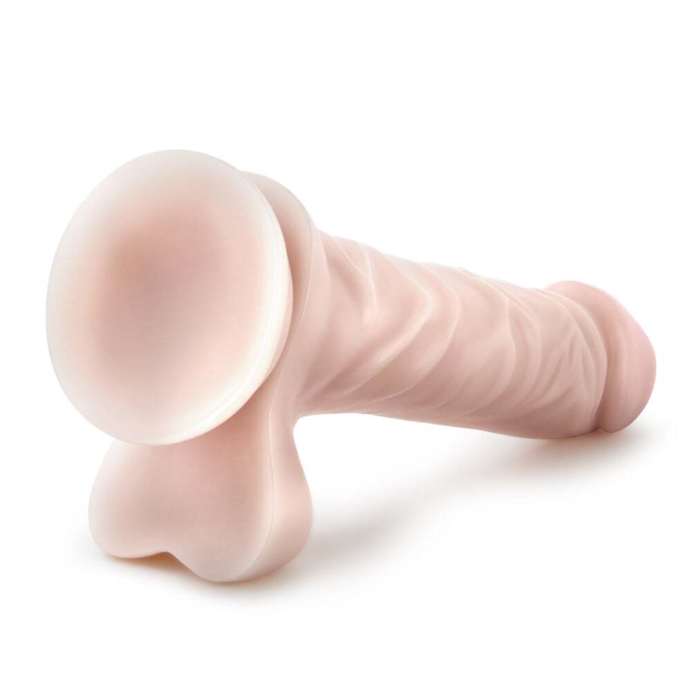 9 inch Dildo by Blush in Vanilla Ivory Beige shown for pegging Her or Him