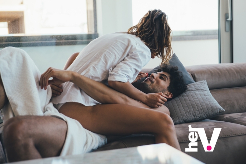 The couch rider sex position guide showing a couple enjoying a playful and intimate couch-based position