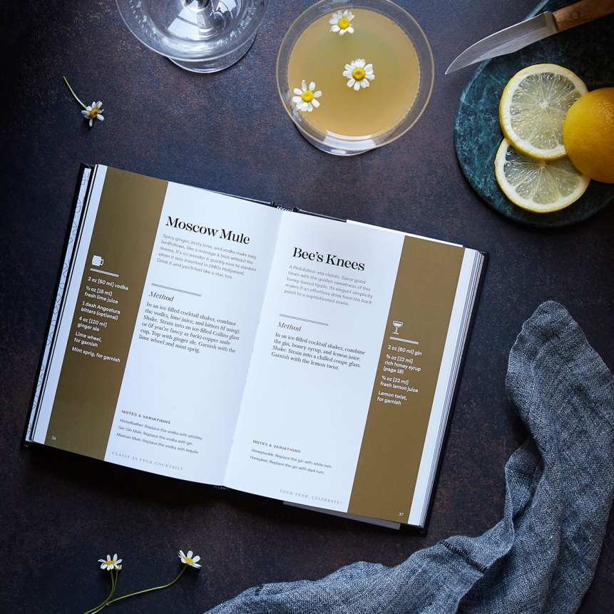 Buy  classy as fuck cocktails book for her.