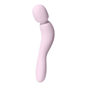 Dame Products vibrator Com by Dame Quartz shown in hand for scale