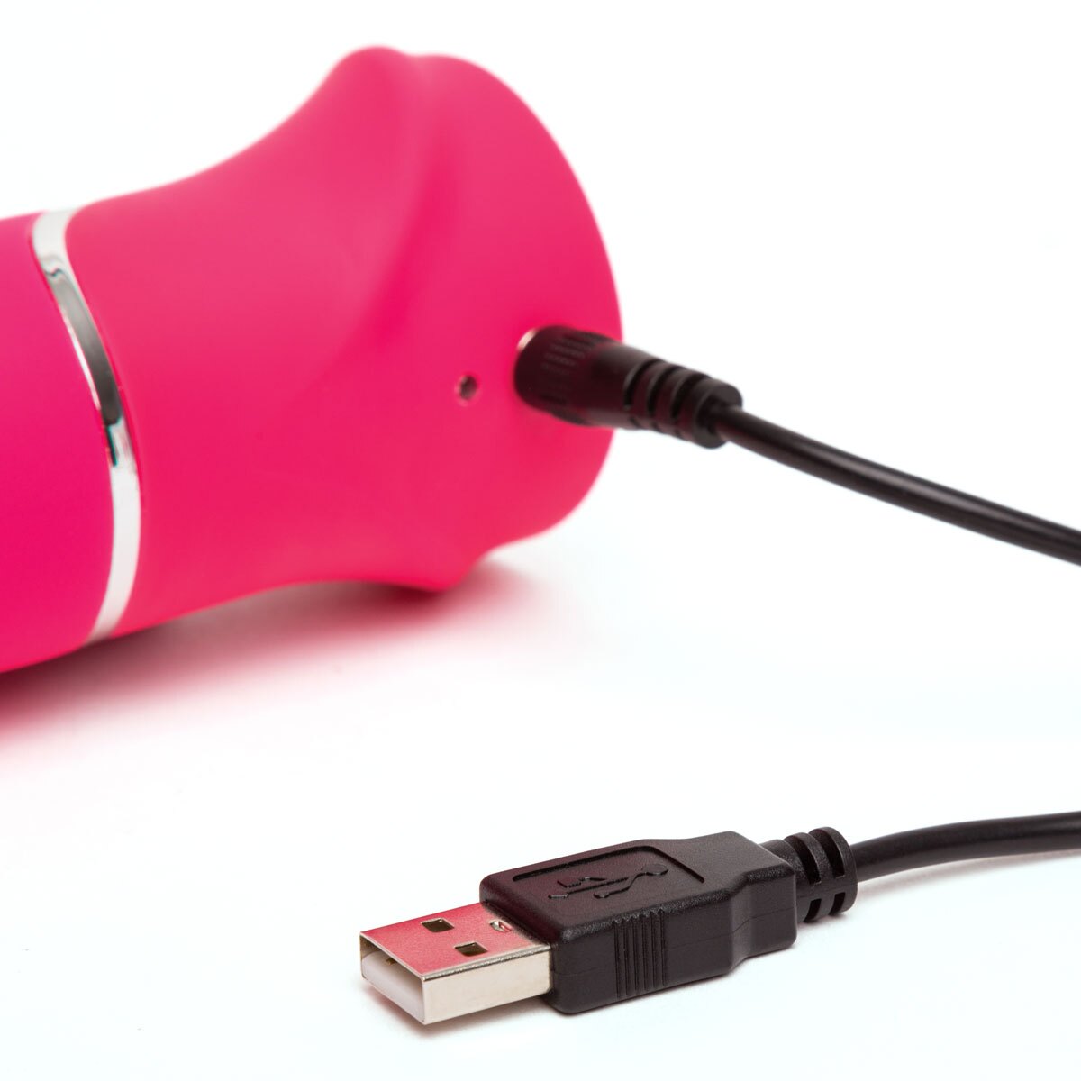 Close-up of the Pink Happy Rabbit vibrator for texture detail