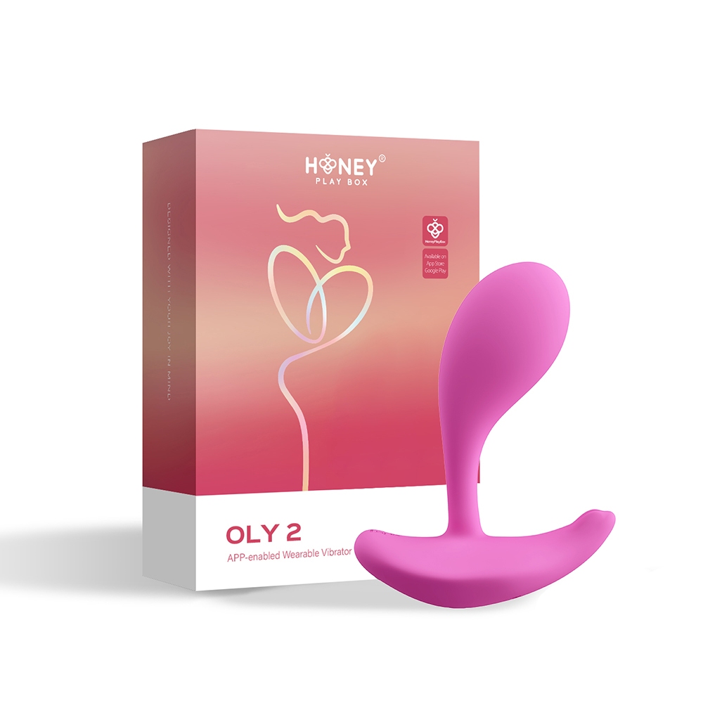 Honey Play Box vibrator HPB Oly 2 PressureSens App Wear Pnk shown in hand for scale