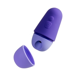 ROMP vibrator Free X shown in hand for scale