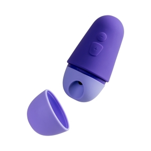 ROMP vibrator Free X shown in hand for scale