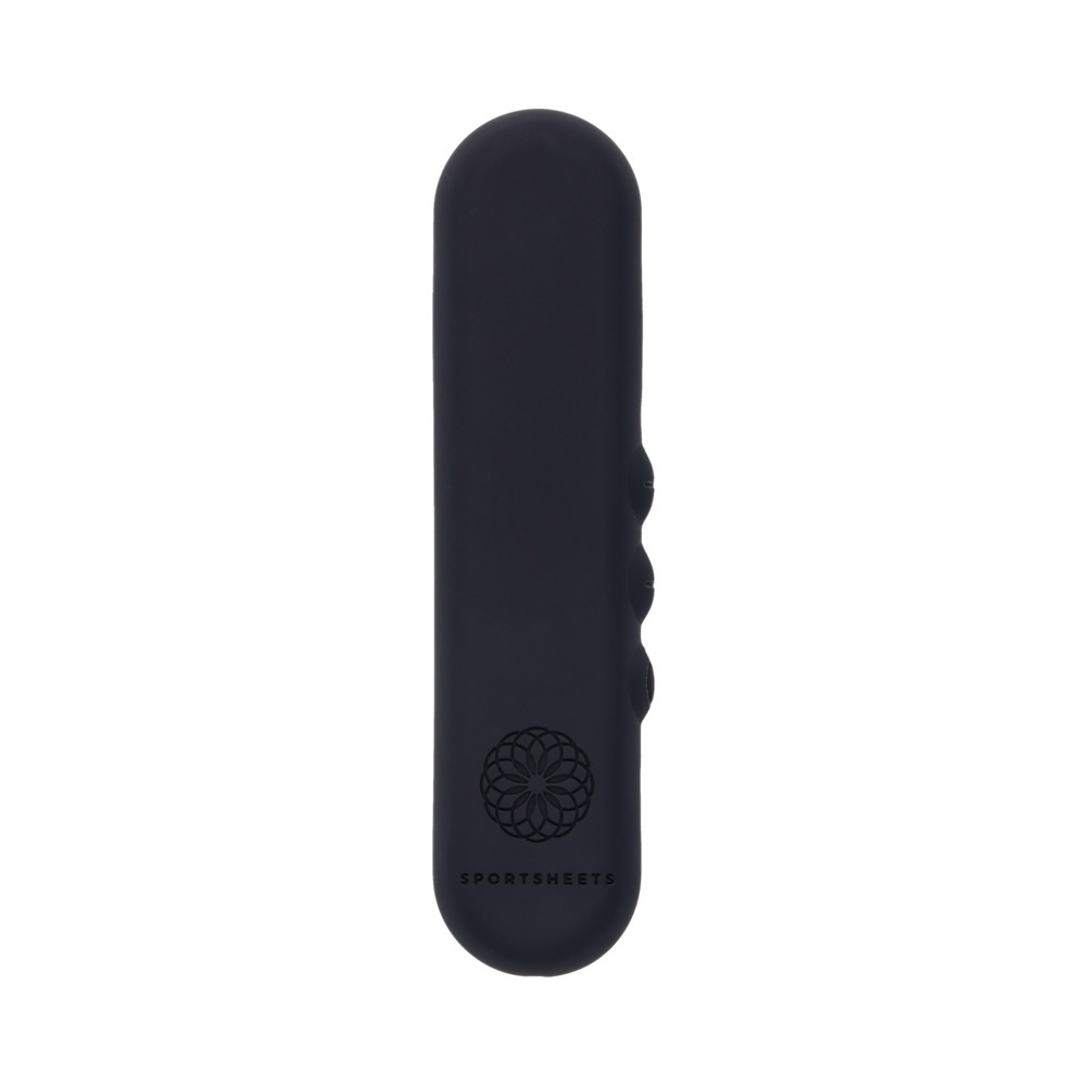 Black Sportsheets vibrator SS Pivot Flat shown in hand for scale