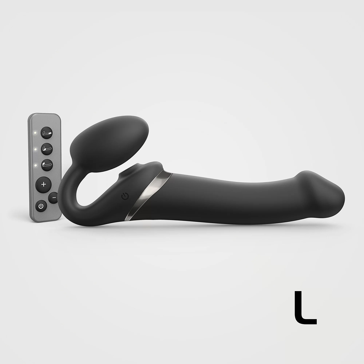 Black Strap-On-Me vibrator Orgasm Large Bendable Strap-On shown in hand for scale