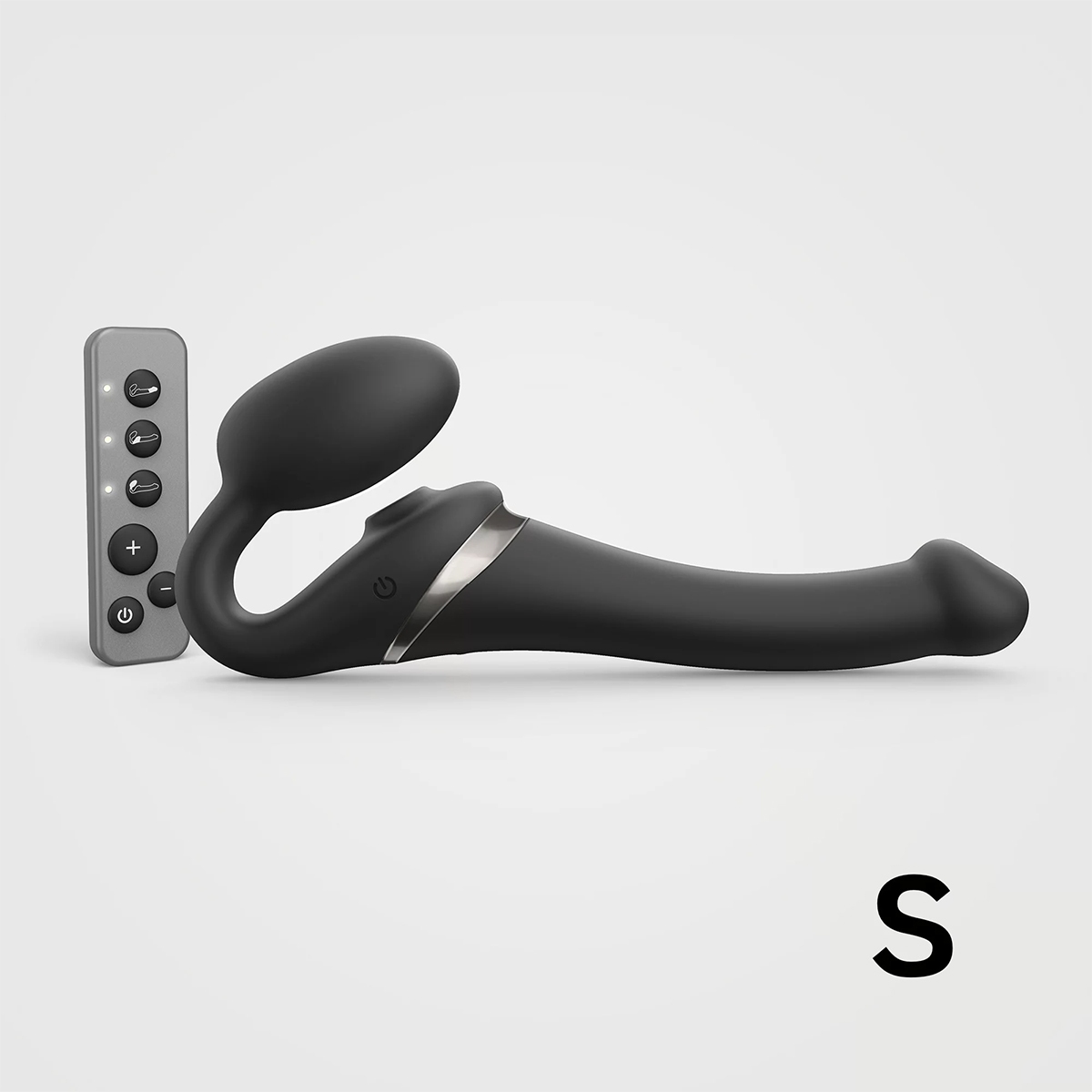 Black Strap-On-Me vibrator Orgasm Small Bendable Strap-On shown in hand for scale