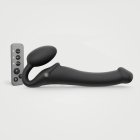 Black Strap-On-Me vibrator Medium shown in hand for scale