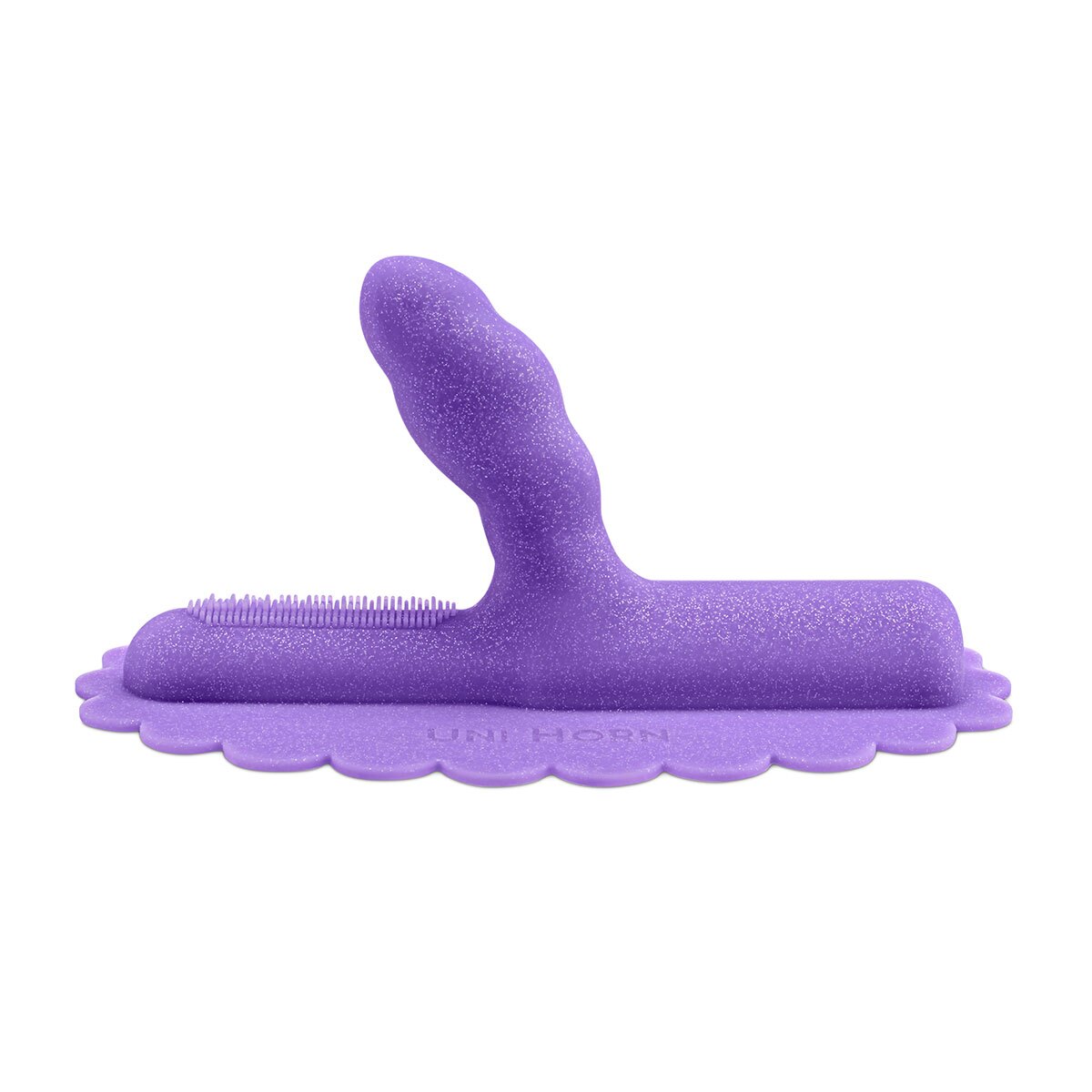 Cowgirl vibrator Unicorn Uni-Horn Attachment shown in hand for scale