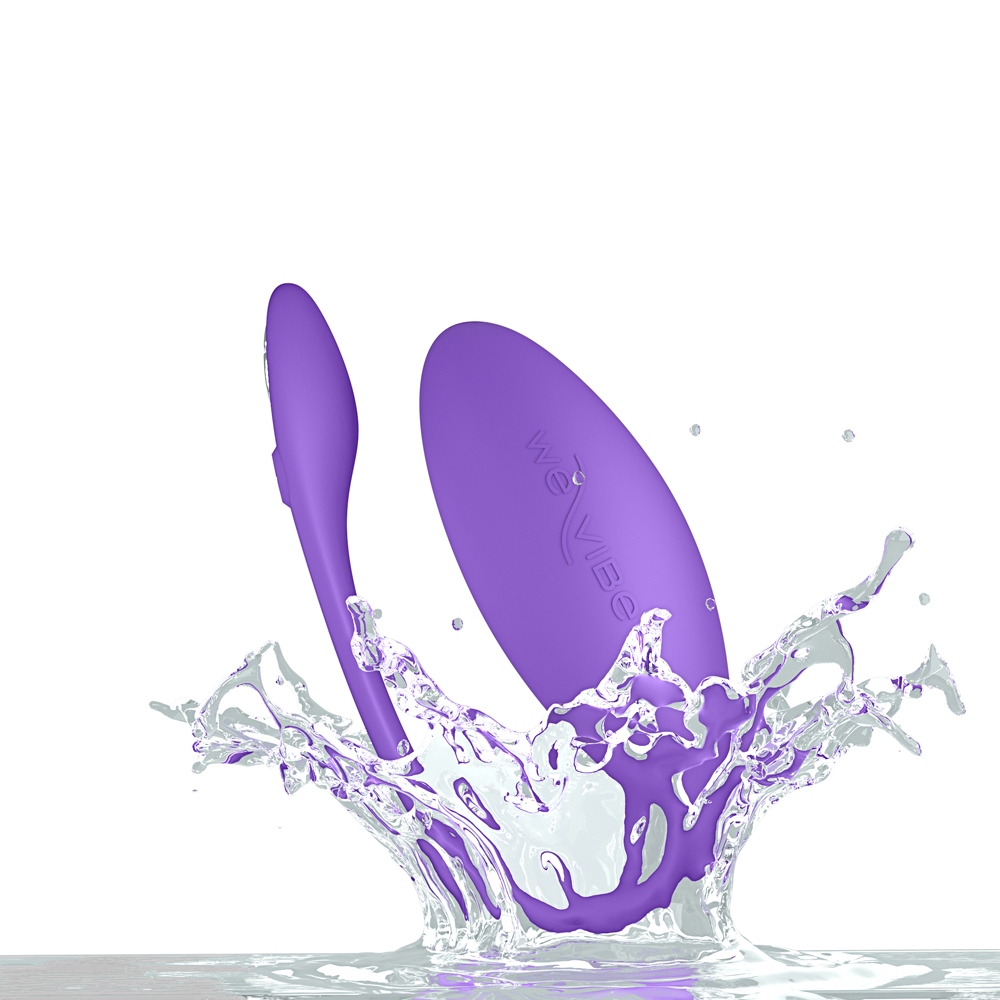 Lifestyle shot featuring the Purple We-Vibe vibrator beside the bed