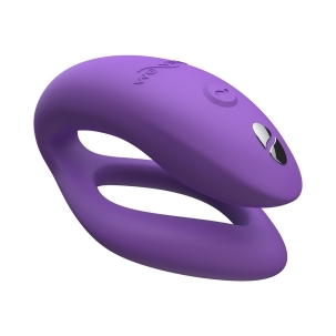 Purple We-Vibe vibrator Sync O Light shown in hand for scale