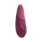 Pink Womanizer vibrator Dusky shown in hand for scale