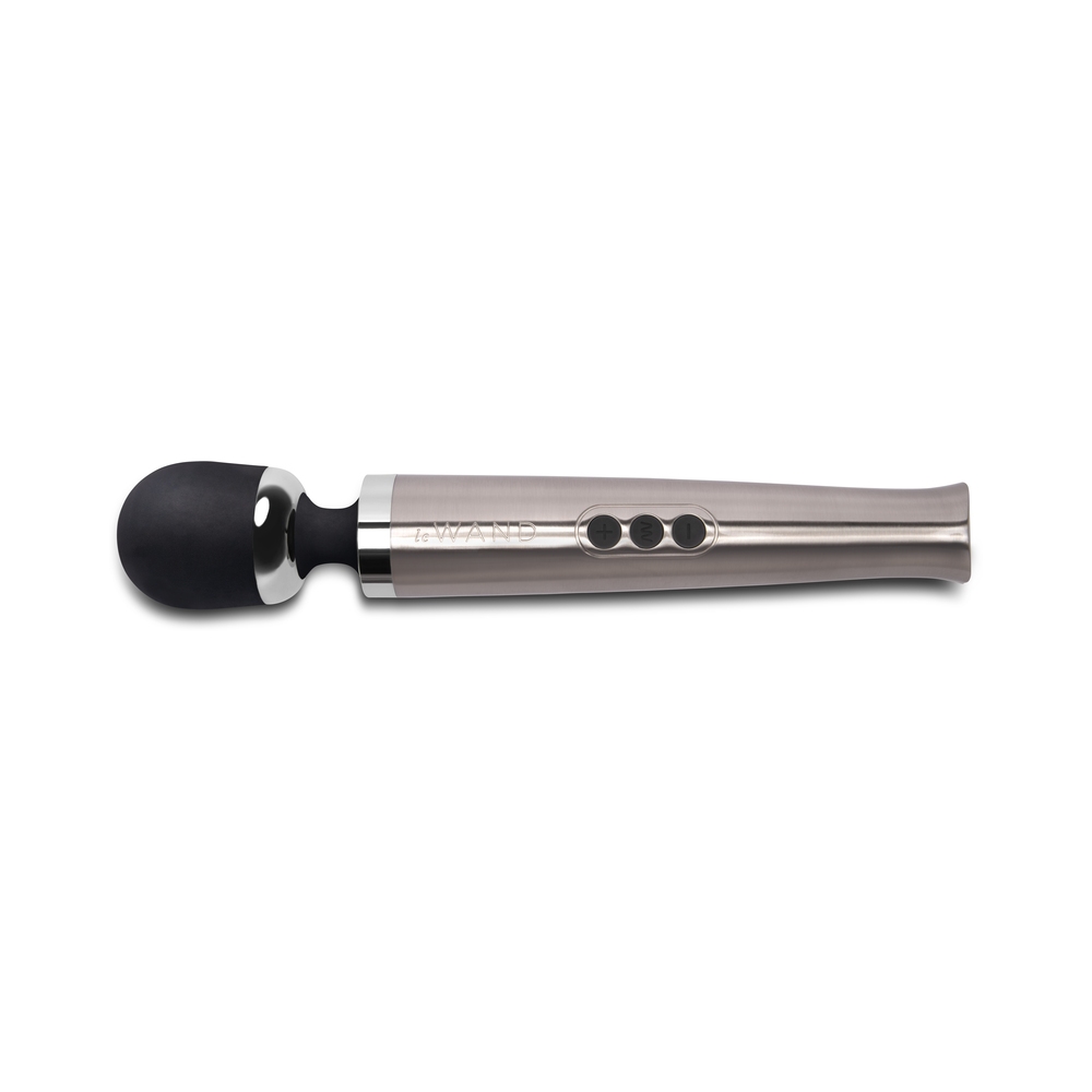 Silver Le Wand vibrator Die Cast Rech shown in hand for scale