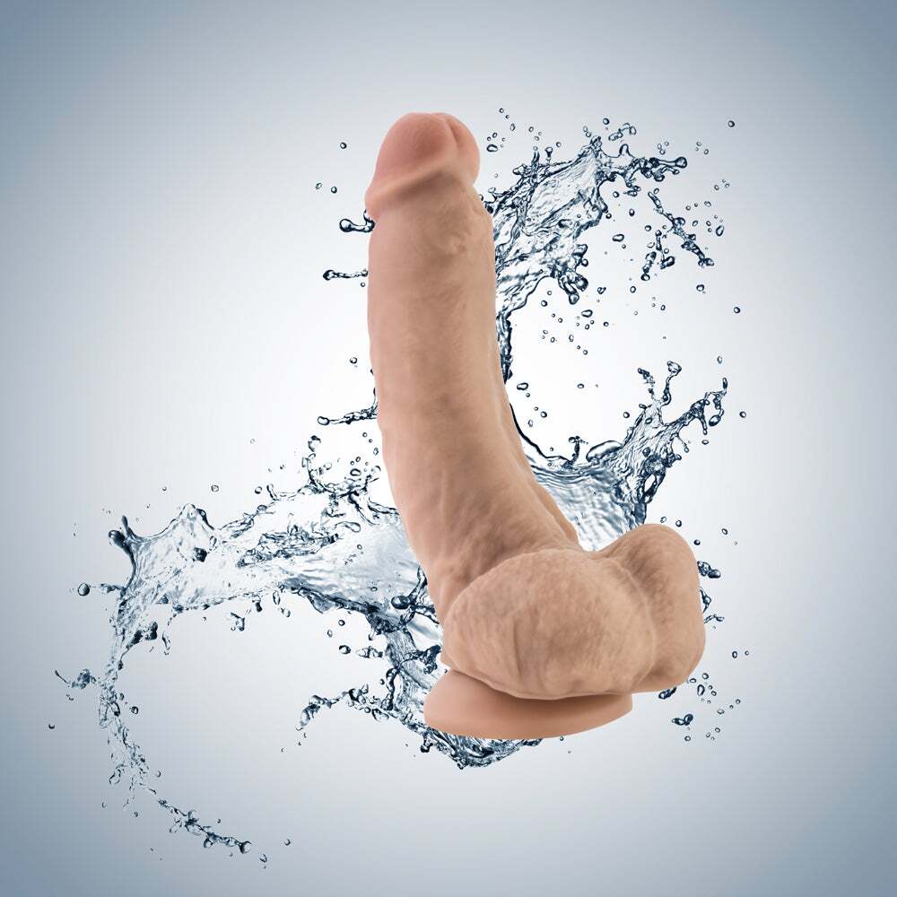 9 inch Dildo by Blush in Vanilla Ivory Beige displayed for pegging Him or Her