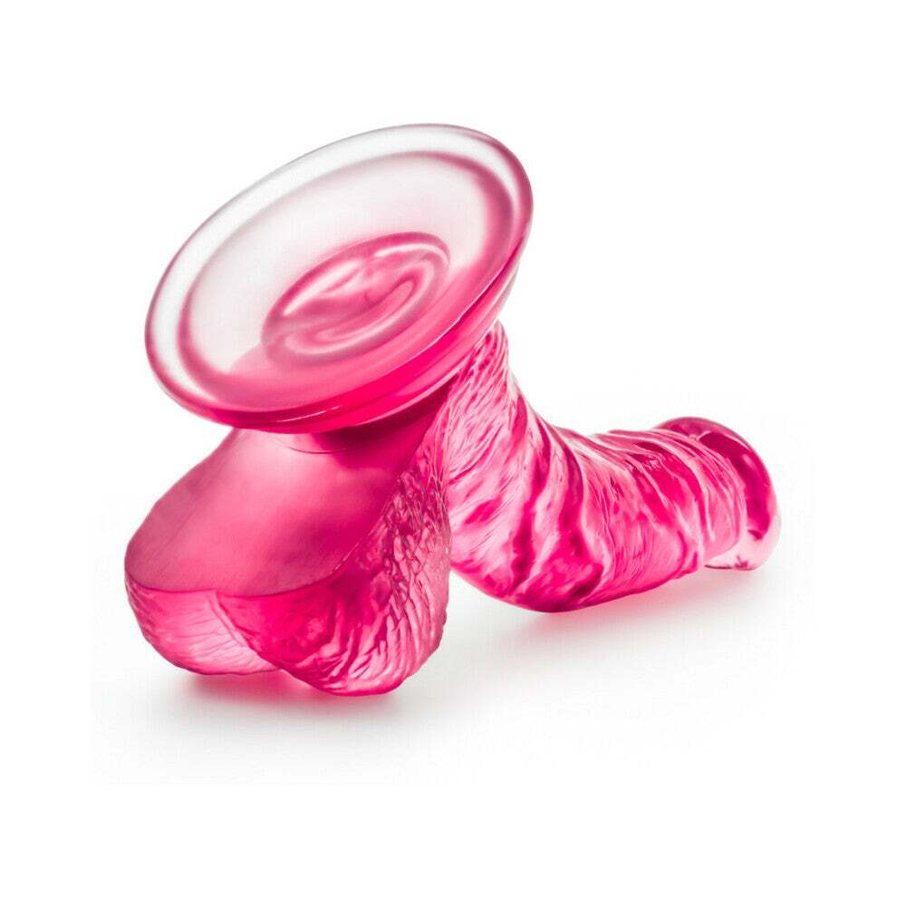 6.5 inch Dildo by Blush in Hot Pink Magenta Fuchsia shown for pegging Her or Him