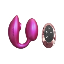 W Remote Lovely Planet vibrator Love to Love Wonderlover Iridescent Berry shown in hand for scale