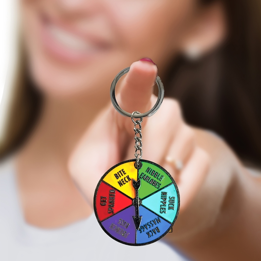 Buy  super fun key chain sex spinner book for her.