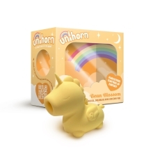 Yellow Creative Conceptions vibrator Unihorn Bean Blossom shown in hand for scale