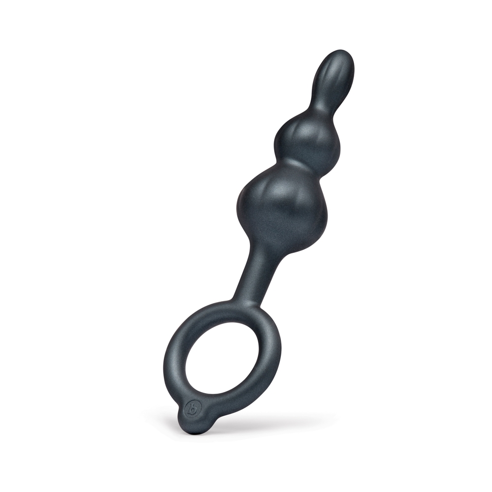 Lifestyle shot featuring the  B-Vibe vibrator beside the bed