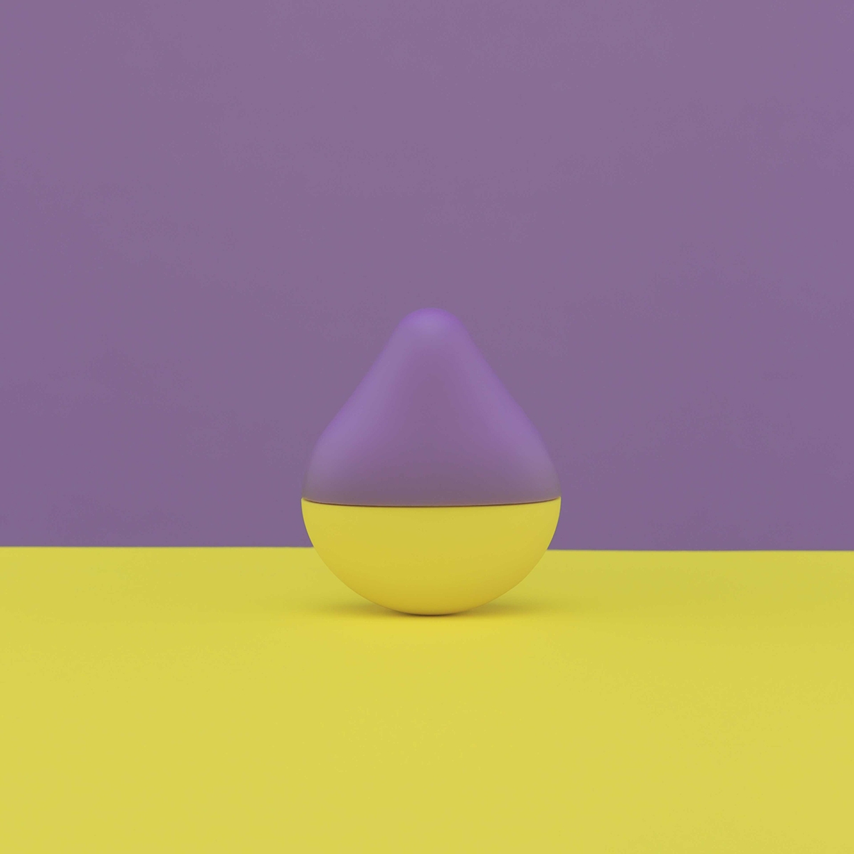 TENGA vibrator iroha Mini Fuji-Lemon shown in hand for scale