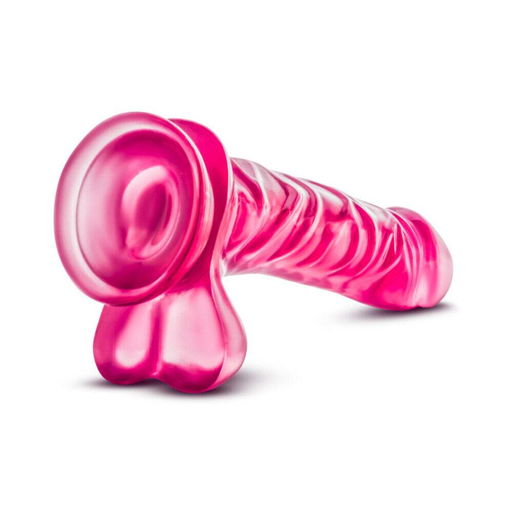 9 inch Dildo by Blush in Hot Pink Magenta Fuchsia shown for pegging Her or Him